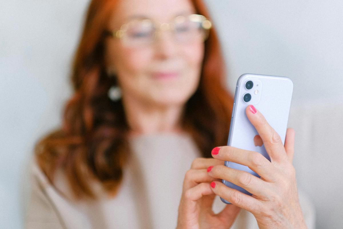 woman holding phone